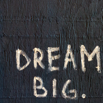 Dream big written on piece of wood